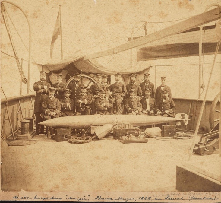 Sepia tinted photograph of Argentinian sailors with Whitehead torpedo in Austria, 1888.